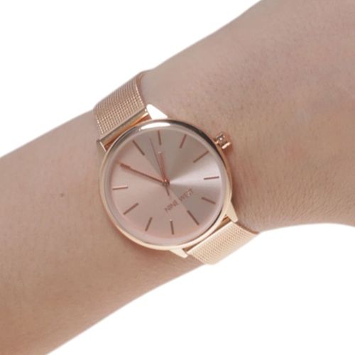 Reloj Nine West análogo metálico rose gold para mujer